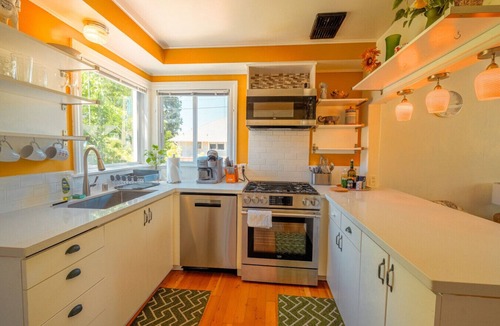 North End House | Pet Friendly Home with Hot Tub & Fenced Yard
