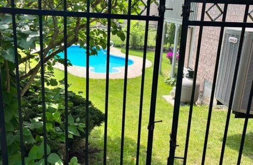 Whitby House | Poolside entire lower level apt