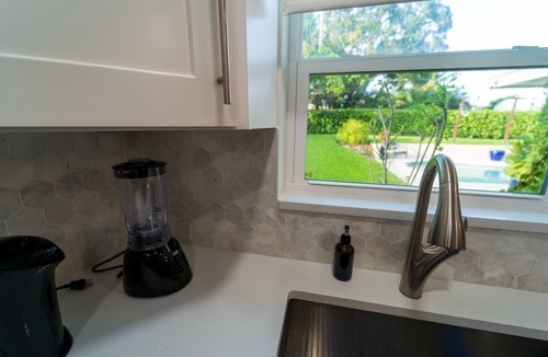 Lake Worth Corridor House | Poolside Paradise Luxury home Mins from the beach