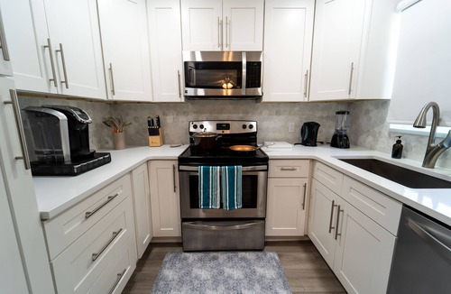 Lake Worth Corridor House | Poolside Paradise Luxury home Mins from the beach