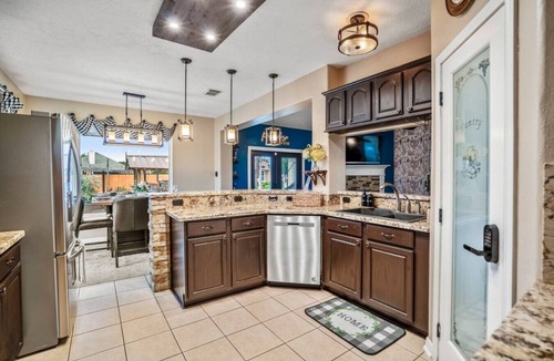 Alvin House | Private Alvin Mini Resort with Pool, Waterslide and Hot Tub