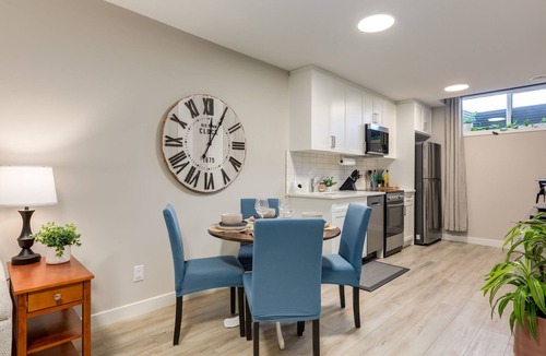 Southeast Calgary House | Private Calgary Suite | Full Kitchen, Laundry, Workspace & Free Parking