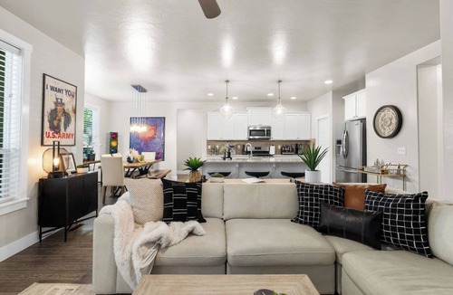 Northwest Boise City House | Relax and recharge at this luxury Boise retreat featuring a private hot tub, sauna, fire pit, game room, and Peloton. Perfect for families, groups, and weekend getaways, this spacious 4-bedroom home comfortably sleeps 9 and is conveniently located.