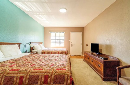 Sweet Home Hotel | Rest Easy in a Fresh, Clean Room with Quick Highway Access in Yoakum.