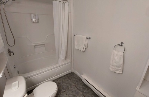 Eastern Passage Apartment | Seafront suite with year-round hot tub.
