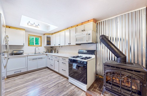 Bellingham House | Secluded, single-level getaway with a large yard, gas fireplace, & dog friendly