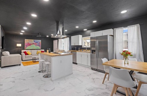 University Area House | "Sleek and Modern UMED Retreat: Black and White Beauty"