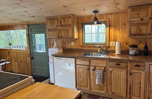 Lucerne-in-Maine Cabin | Spacious 2-bedroom log cabin in tranquil Dedham, Maine with AC.