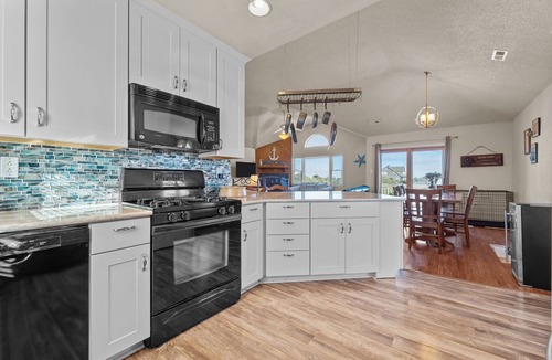 Corolla House | Spacious 4-bedroom house in beautiful 4x4 area of Corolla with ocean views!