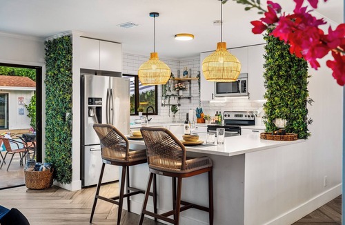 Lake Clarke Shores House | Spacious Palm Beach Paradise with Heated Pool and Backyard Games