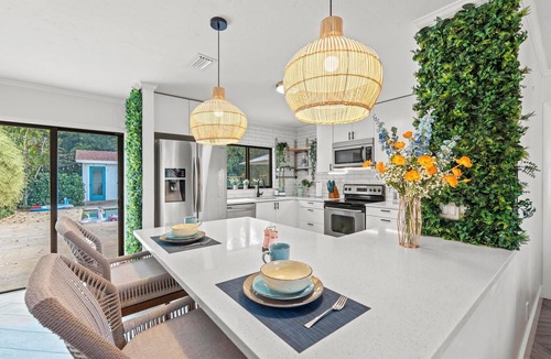 Lake Clarke Shores House | Spacious Palm Beach Paradise with Heated Pool and Backyard Games
