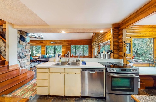 Washougal Cabin | Spacious riverfront lodge with beach access, private hot tub & forest views