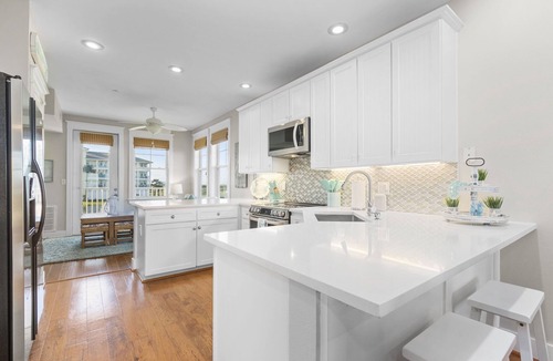 Red Fish Cove Condo | STUNNING BEACHFRONT WITH TRIPLE WATER VIEWS OF OCEAN, LAKE, BAY!