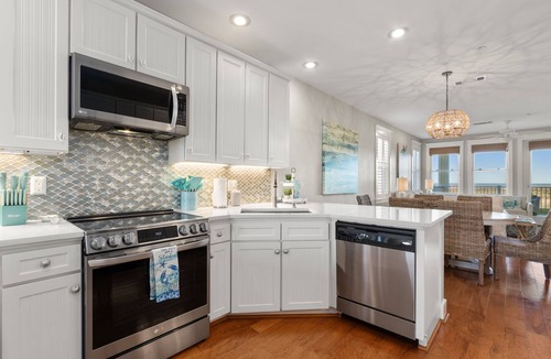 Red Fish Cove Condo | STUNNING BEACHFRONT WITH TRIPLE WATER VIEWS OF OCEAN, LAKE, BAY!
