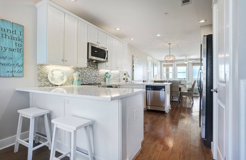 Red Fish Cove Condo | STUNNING BEACHFRONT WITH TRIPLE WATER VIEWS OF OCEAN, LAKE, BAY!