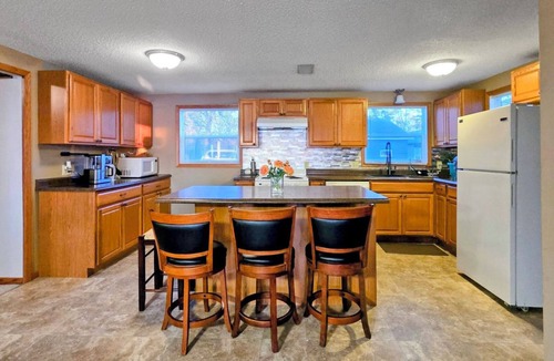 Isle House | Sunset Harbor Retreat,3 bed, 2 bath w/private launch and dock in charming Isle