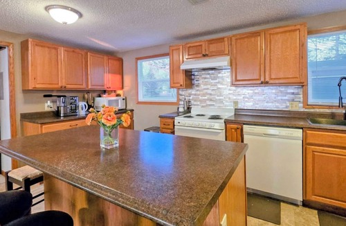Isle House | Sunset Harbor Retreat,3 bed, 2 bath w/private launch and dock in charming Isle