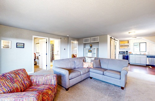 West End House | Water-view home with ADU, gated entry, hot tub, enclosed yard, deck, & 2 W/Ds