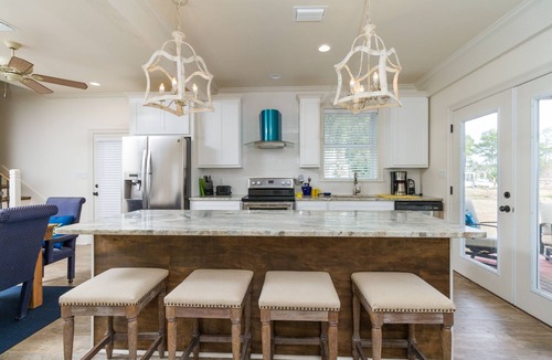 Ono Island House | Waterfront Home on Perdido Beach in Elberta with sandy beach, pier & boat house.
