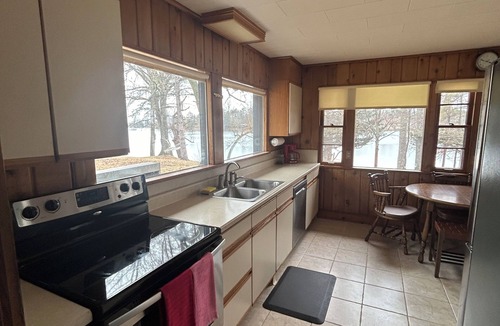 Park Rapids House | Waterfront right in town. 200 ft. of clear shoreline. On an acre lot.