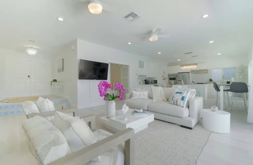 West Palm Beach House | Waterfront Sanctuary, Heated Pool, Parking, Sauna