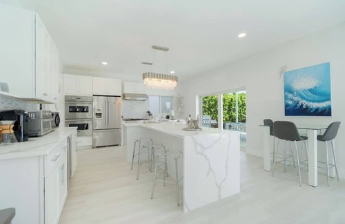 West Palm Beach House | Waterfront Sanctuary, Heated Pool, Parking, Sauna