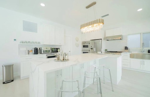 West Palm Beach House | Waterfront Sanctuary, Heated Pool, Parking, Sauna