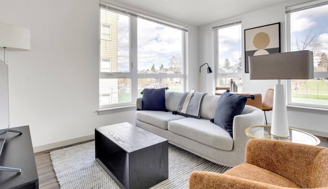 Airy Columbia City 2BR w/ W/D & Gym, steps to Light Rail, by Blueground