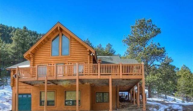 Beautiful Log Cabin with Acreage