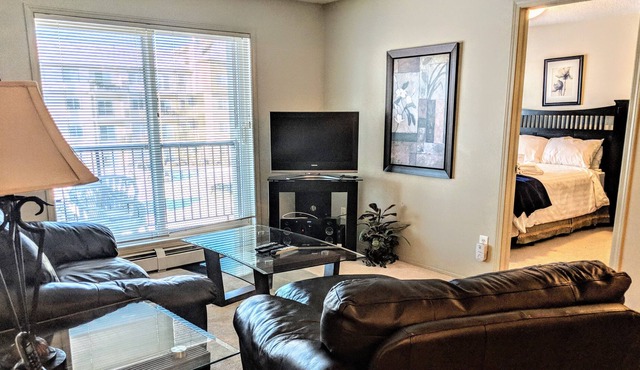 Bright Clean 2 bed 2 bath, U/G parking, 1 min away from transit hub