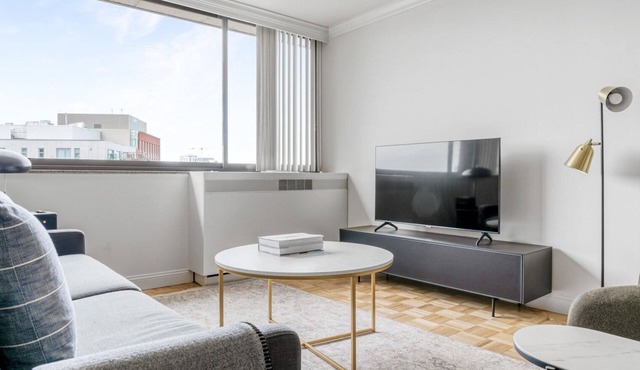 Bright Symphony 1BR w/Doorman & Business Center, near MFA, by Blueground