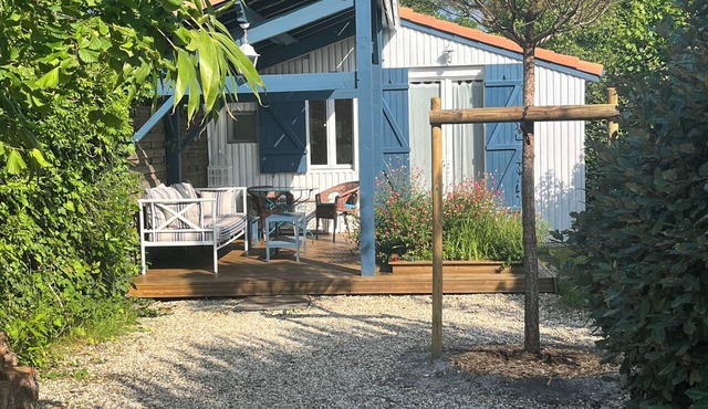 Cabane Edena, Terrasse Ombragée Jardin Vélos Wifi à 350m de la Plage du Mauret in Andernos-les-Bains
