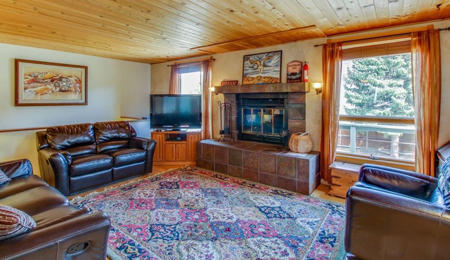 Conveniently located, spacious home with large private hot tub & fireplace
