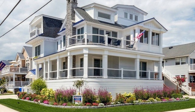 New construction, single-family home boasts 5 bedrooms and 5.2 baths, offering luxury and comfort in Avalon