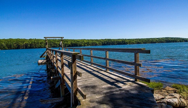 Private waterfront home with large deck & deep water dock