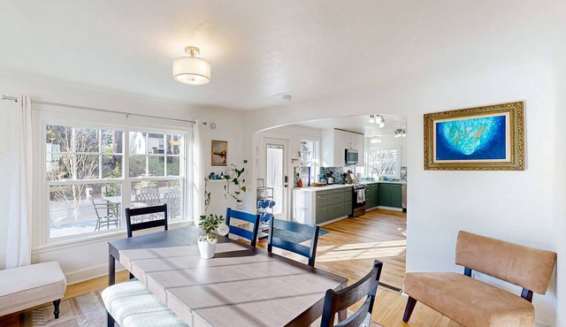 Renovated home in central location with hot tub, theater, fast wifi & work desks
