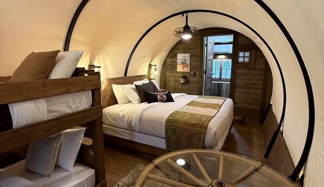Rustic Covered Glamping Wagons with Modern Comforts Near Wall Drug – Wall, South Dakota