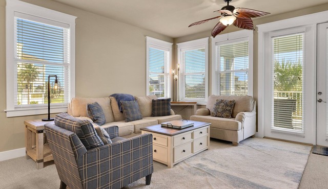 Spacious beach condo with ocean view, balcony, shared pool & close to the beach