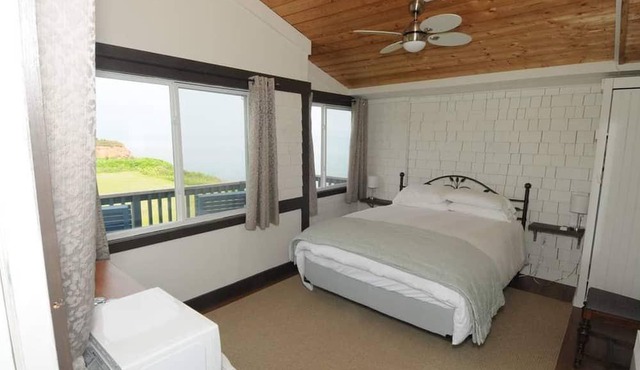 Spacious inn perched on cliff above the sea