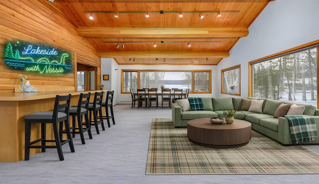 Spacious Lakeside Home with Firepit, Wraparound Deck, Kayaks & Gym