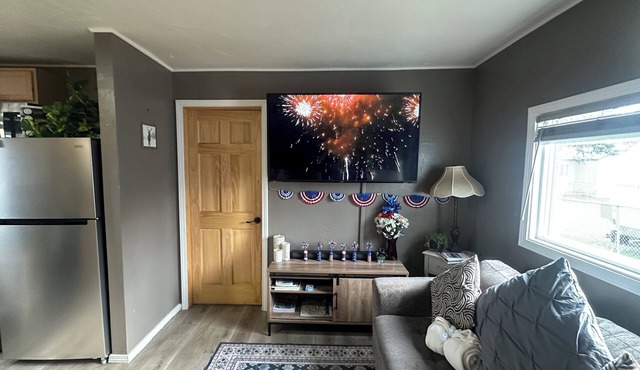 Unique 1 bedroom custom remodeled low energy foot print unit in private complex.
