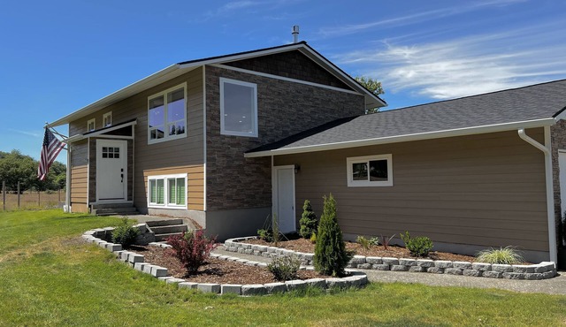 Unique renovated 4 bedroom home on private corner lot