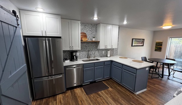 Updated townhouse in quiet cul de sac. Private fenced yard & off-street parking.