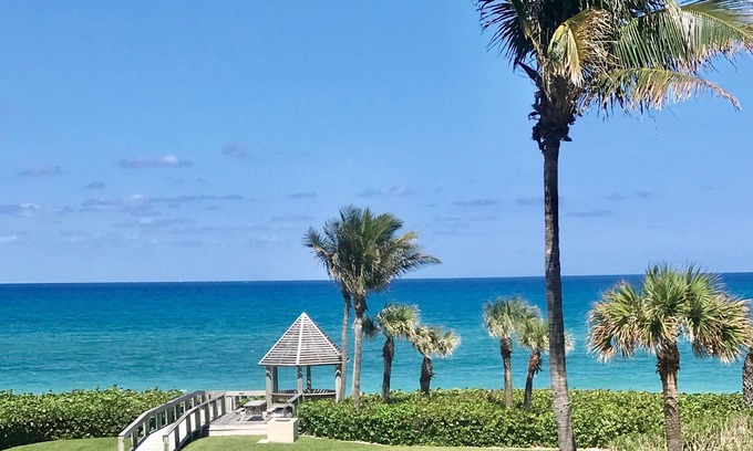 Juno Beach Condo | OceanFront Condo Renovates with Heated Pool & Hot tub Directly on the Beach!