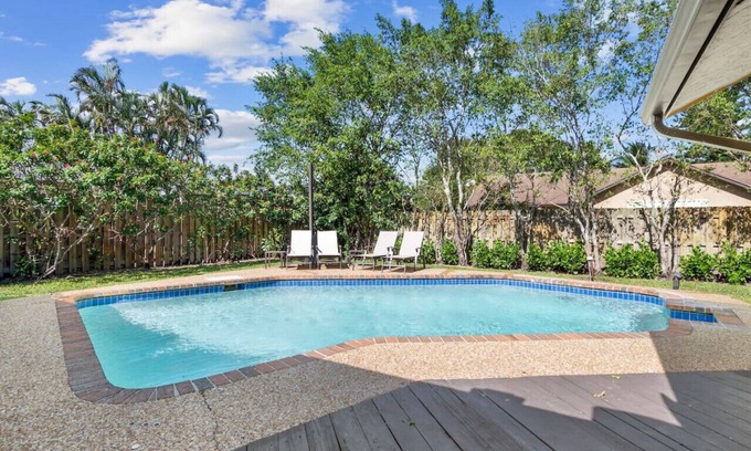 Tropic Palms Apartment | Pet Friendly 8 Min to Atlantic Ave w/Heated Salt Pool